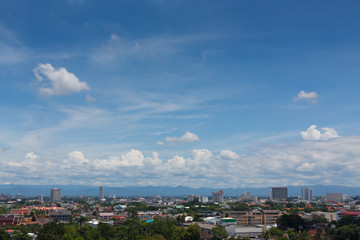 white cloud on blue sky above the town, aerial view cityscape