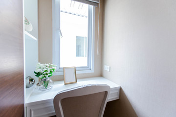 White desk with mock up frame and  chair in home office