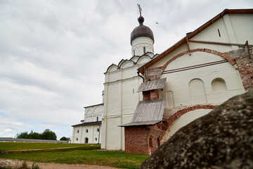 Wall and dome of Ferapontov monastery in a summer day