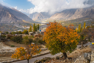 Hunza valley in autumn season surrounded by Karakoram mountain range, Gilgit Baltistan in Pakistan