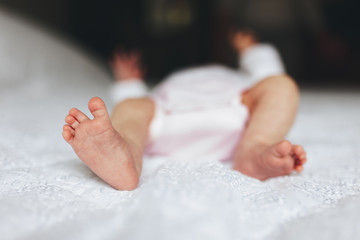 feet of a baby while changing the diaper
