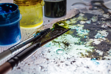 table and paint brushes, creative process