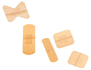Set of multiple different adhesive sticking plaster isolated on a white background