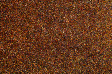 Brown glitter texture. Christmas background.