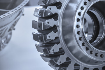 Jet engine gear wheels, industrial background.