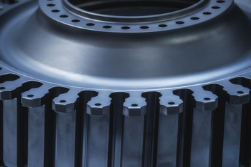 Jet engine gear wheels, industrial background.