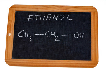 School slate on which is written the chemical formula of ethanol
