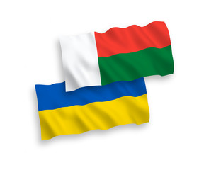 Flags of Madagascar and Ukraine on a white background