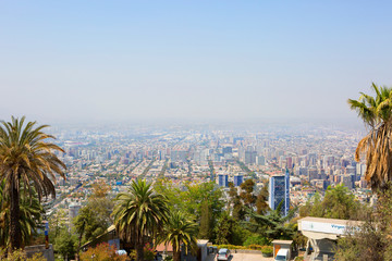 Fototapeta na wymiar Santiago, Chile, View of the city from the San Cristobal hill. From the hill of San Cristobal opens an amazing panorama of Santiago - the city of St. James, the patron Saint of the Castilians, in who