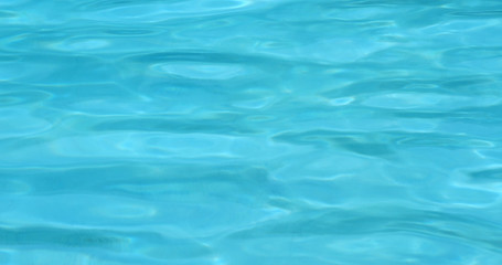 Blue water wave in swimming pool