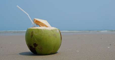 Fresh Coconut drink on the beach