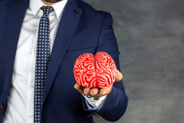 Mental health concept, Doctor holding human brain