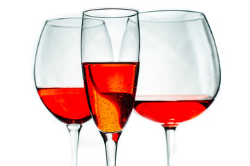 three glass of red wine on white background