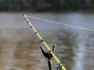 snippets of fishing line and line against the background of the fading water