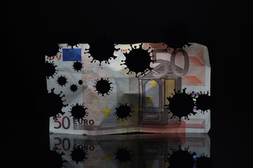 Coronavirus on Euro banknote. Global epidemics and economic impact. Covid-19 coronavirus concept.