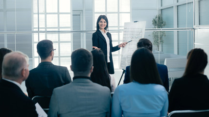 businesswoman making a presentation for the employees of the company