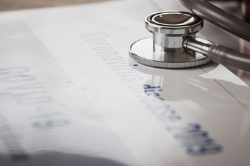 Stethoscope on text covid-19, Coronavirus 2019-nCov novel coronavirus concept : Influenza as dangerous flu strain cases pandemic disease, Virus Pandemic Protection, impact in life work economy world