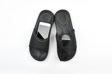 Sunglasses, slippers, smartphone isolated on white background