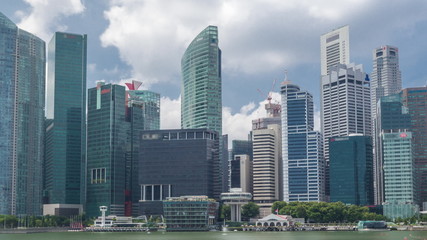 Business Financial Downtown City and Skyscrapers Tower Building at Marina Bay timelapse hyperlapse,...