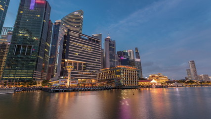 Business Financial Downtown City and Skyscrapers Tower Building at Marina Bay day to night timelapse, Singapore