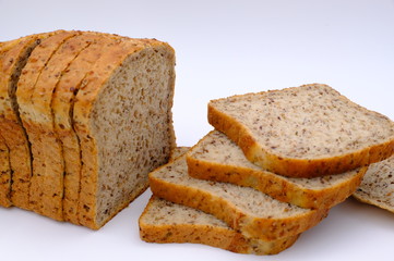 Fresh homemade baked bread and sliced bread isoalted on white background