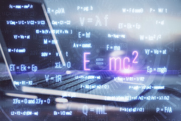 Desktop computer background and formula hologram writing. Double exposure. Education concept.