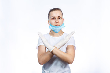 woman health worker in protective medical surgical mask against the virus. Isolated on white background