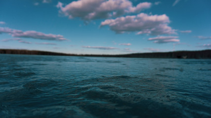 Fototapeta premium the turquoise sky and the ice of a frozen pond lake