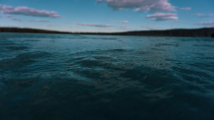 Fototapeta premium the turquoise sky and the ice of a frozen pond lake