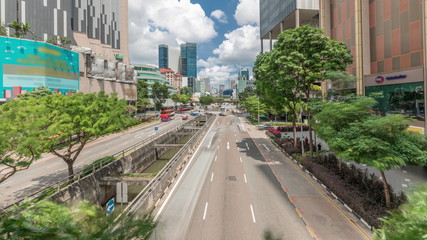 Traffic with cars on a street and urban scene in the central district of Singapore timelapse © HyperlapsePro