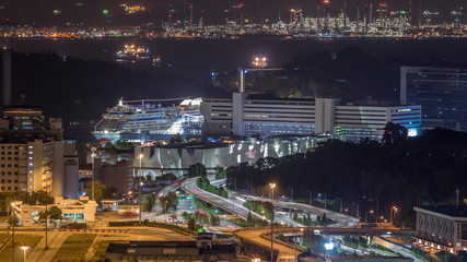 Fototapeta na wymiar Singapore Cruise Centre is a cruise terminal aerial night timelapse