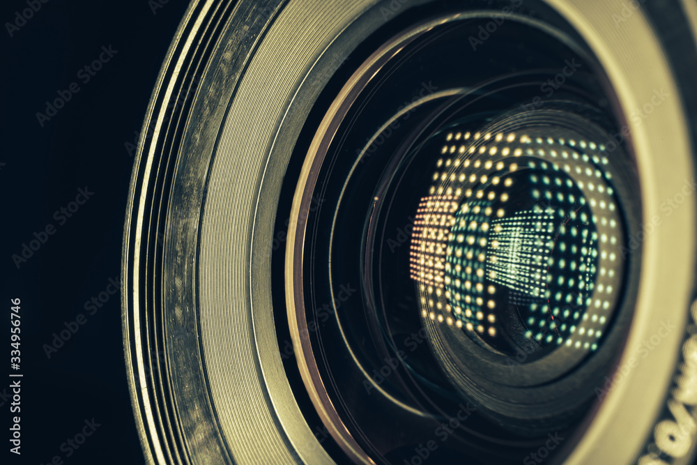 Aufkleber Beautiful camera lens with light reflection. Background pattern for design. Macro photography view..
