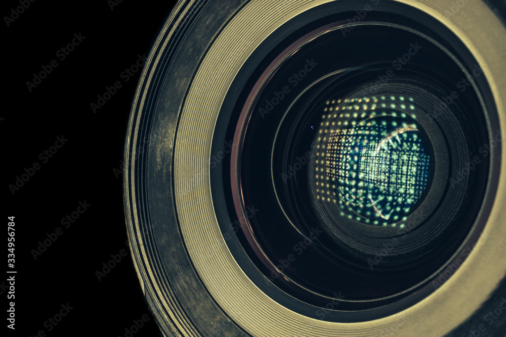 Aufkleber Beautiful camera lens with light reflection. Background pattern for design. Macro photography view..