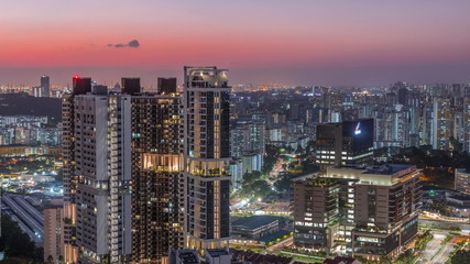 Aerial skyline with apartment buildings and skyscrapers of Singapore timelapse