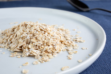 A view of a plate of steel cut oats on a white plate.