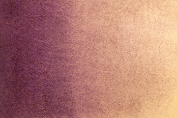 Abstract art background dark purple and beige colors. Watercolor painting on canvas with soft golden gradient.