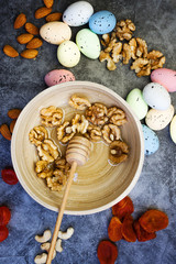Still life, food and drink concept. Baking background with ingredients: sugar, flour, eggs, butter, spices for pie, easter cake, cookies on a grunge table. Selective focus, copy space, top view