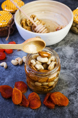 jar of honey isolated on white background