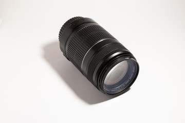 Lens 55-250 mm, close-up, on a white background