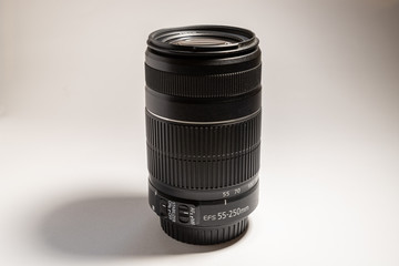 Lens 55-250 mm, close-up, on a white background