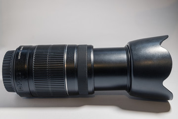 Lens 55-250 mm, close-up, on a white background