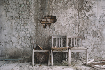 Broken chairs in the exclusion zone. Chernobyl Pripyat. Ukraine.