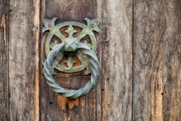 Close up detail of an ornate dorr knocker