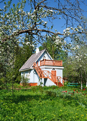 Caption	Small  cottage with a terrace overlooking the garden in spring, Anton Chekhov museum,...