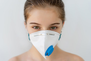 Attractive girl in protective mask