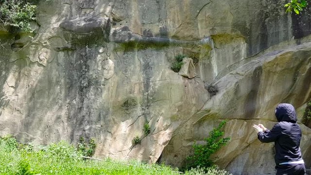 Man Measuring Nuclear Radioactivity of Mountain