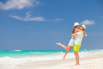 Fototapeta na wymiar Attractive Young Couple on Tropical Beach. Cayo Largo, Cuba