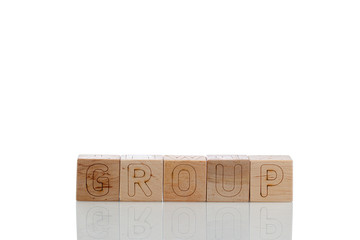 Naklejka premium Wooden cubes with letters group on a white background