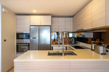 Interior design in villa, house, home, condo and apartment feature island counter, refrigerator and kitchen appliance