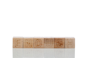 Wooden cubes with letters enough on a white background
